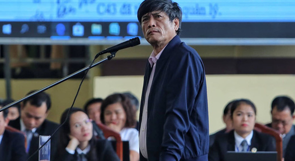 Ông Nguyễn Thanh Hóa khi ra hầu tòa.