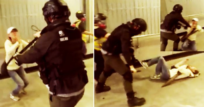 Ngày 1/12, một bà lão đã bị cảnh sát Hồng Kông đẩy ngã xuống đất một cách thô bạo.